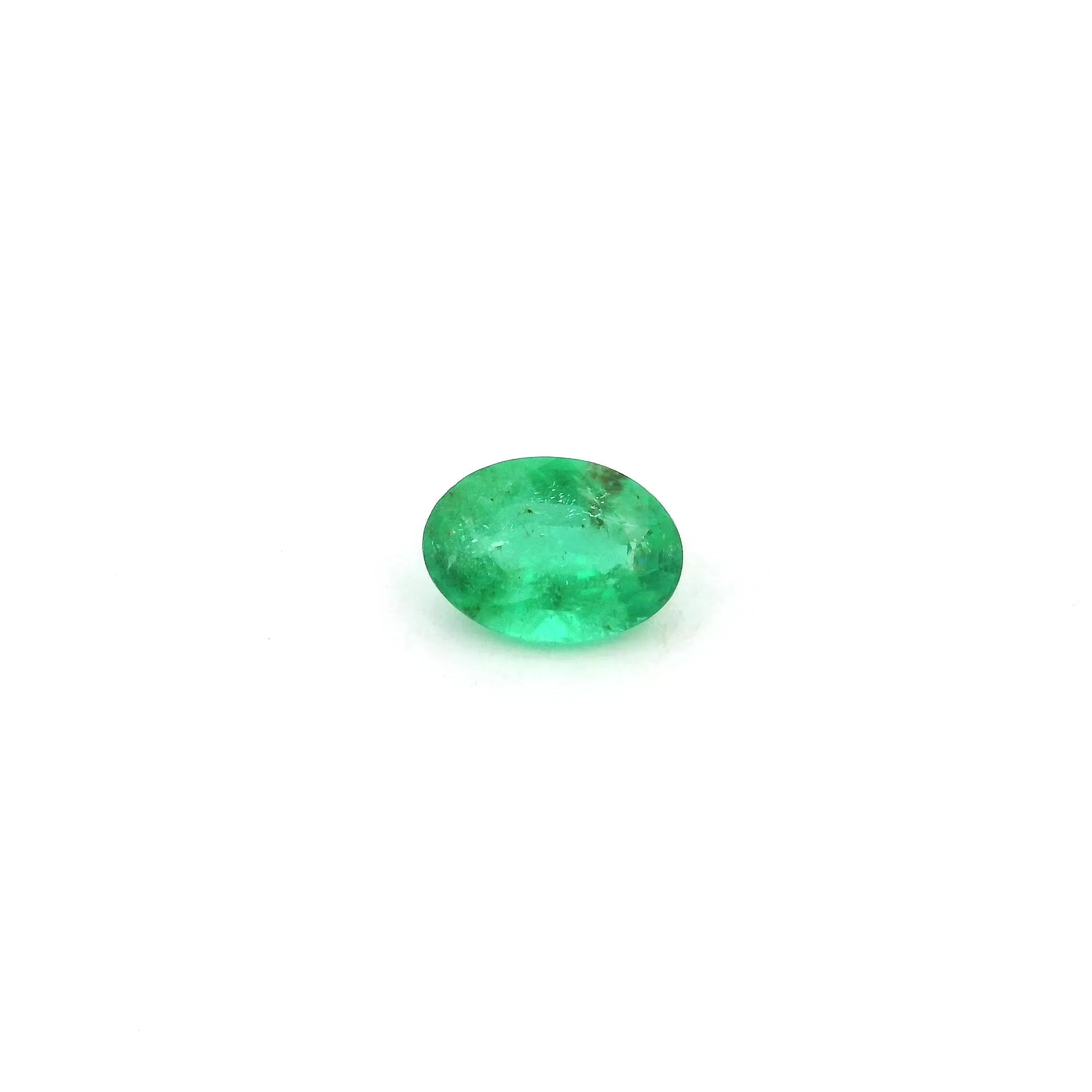 0.59ct Oval Natural Emerald (Colour Green, Clarity Slightly Included, Cut Faceted)