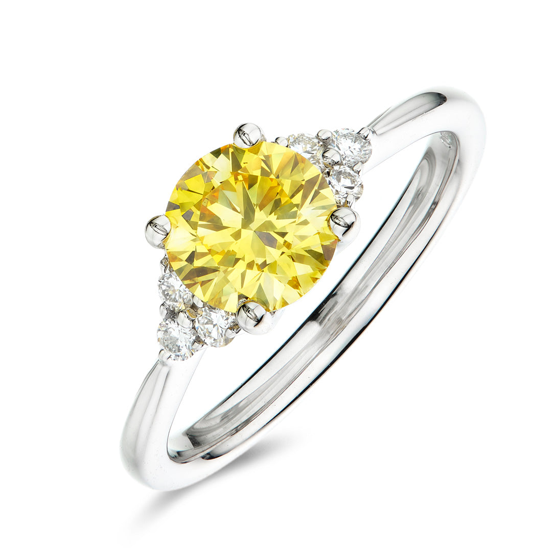 Round 1.07ct Fancy Vivid Yellow VS1 with Side Stones | Platinum | IGI Certified